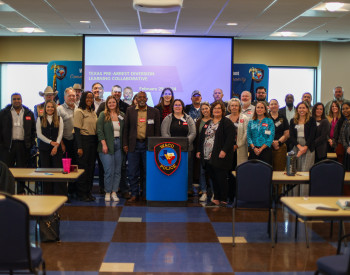 A group photo of attendants at the Pre-Arrest Diversion Learning Collaborative meeting.